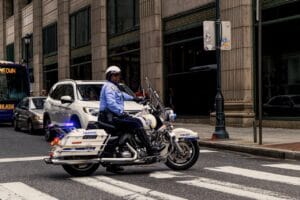 Photo of Man Riding Motorcycle Road conditions and motorcycle accidents