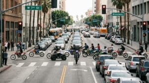 Group of motorcycles and dirt bikes blocking traffic during a California street takeover